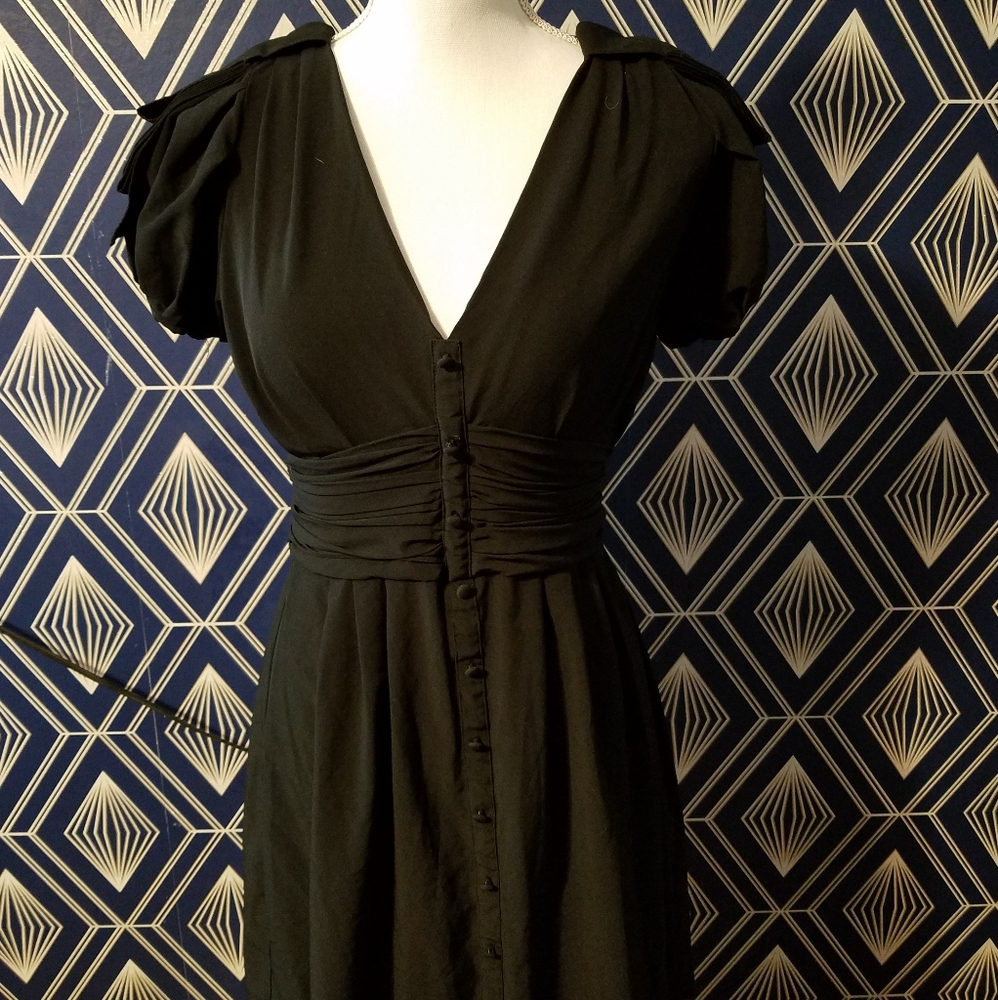 Black dress with tiny waist and awesome shoulders